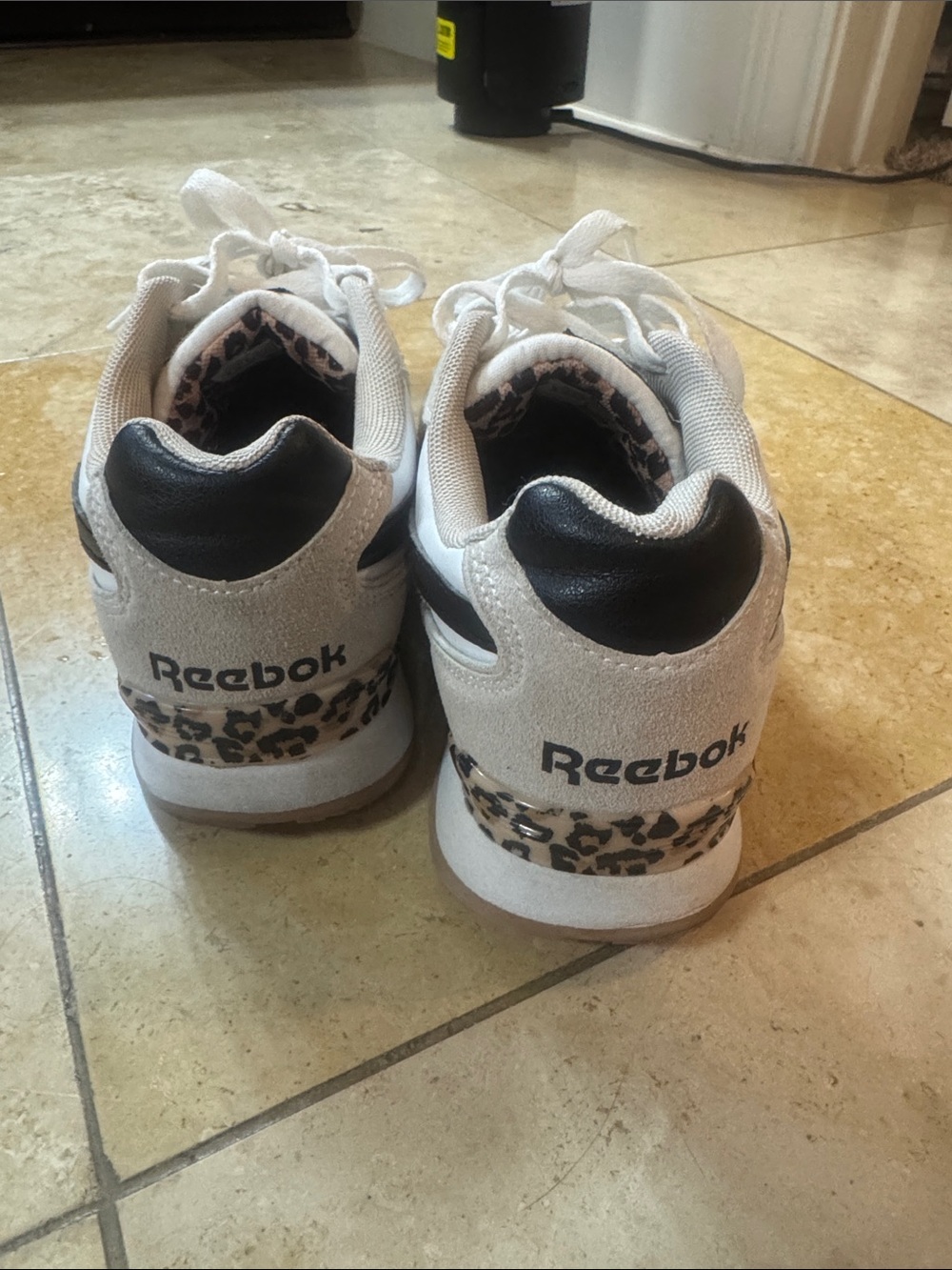 Reebok ladies White and Black Sneakers with Leopard Accent